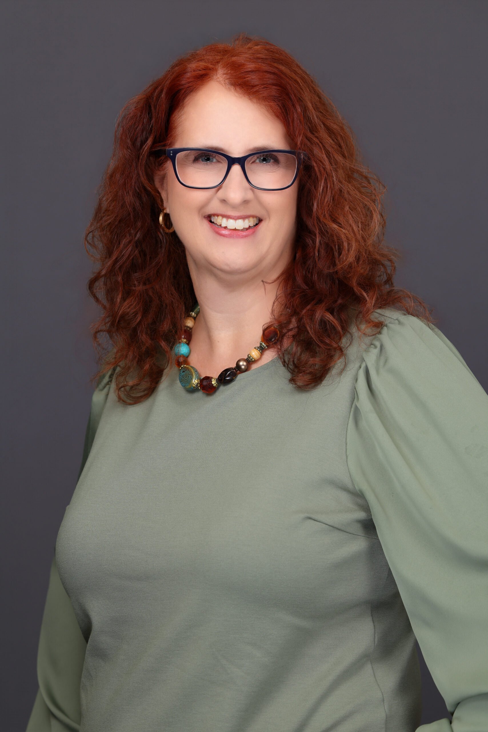 April D. Mohnshine, LCSW, smiling in a professional portrait